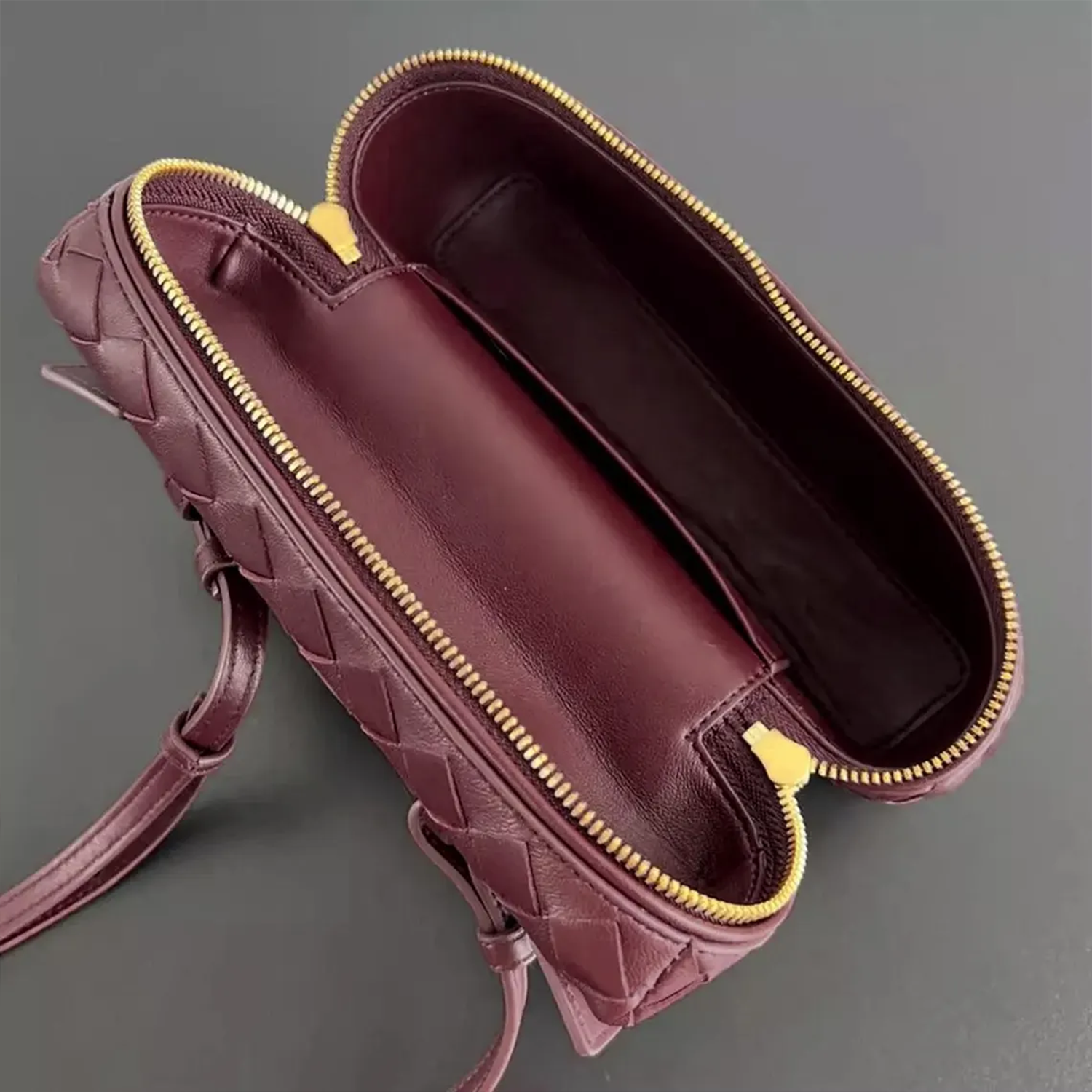 Interlaced Diamond Woven Box Carry Case With Gold Dual-Zip Hardware, Curved Top Grip And Detachable Side Hanging Band